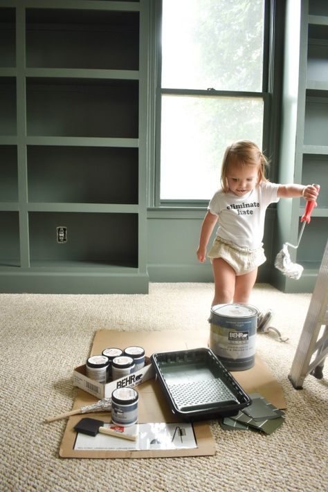 Behr Pinecone Hill Green, Dark Green Office Built Ins, Behr Green Accent Wall, Dark Green Office Paint Colors, Basement Accent Wall Color, Green Painted Bookshelves, Pinecone Hill Behr Paint, Green Office Colors, Pinecone Hill Behr