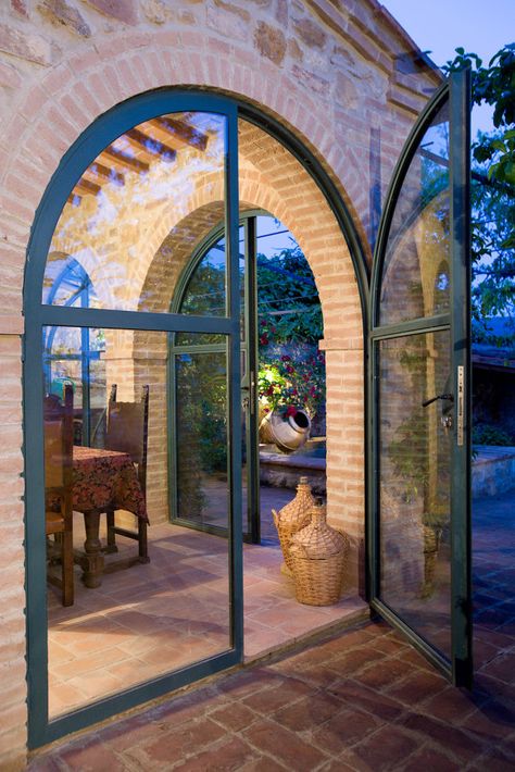 Arch, glass, brick, al fresco Arch Glass Design Living Room, Brick Villa, Arched Glass Doors, Arch Glass Door Interior, Glass Arch Door, Barn House Architecture, Arch Window, Arch Glass Door, Arch Doors