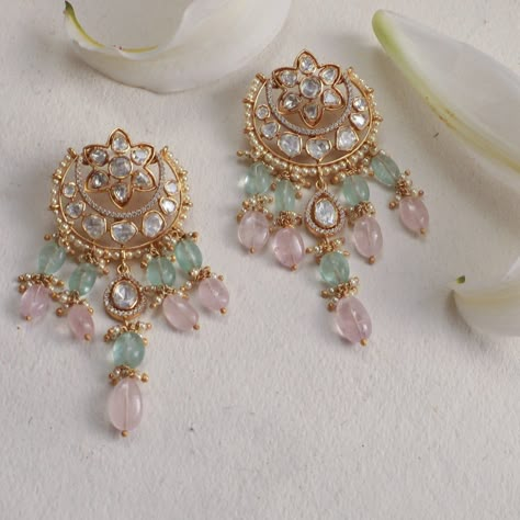 Description Our unmistakable identity reflects on Mehnoor, crafted with gold-plated silver with expert artisanal skills. The iconic Indian crescent motif is enhanced with pink and green pastel beads cascading down. These drop earrings are finished delicately with pearl clusters. Subtle and sophisticated style, for your significant soirees. Product Information Materials used: 925 Silver with 1.0-microns Gold Plating Stones: Semi-precious stones Length: 8 cm Findings: Push-type closure Pastel Moodboard, Desi Earrings, Pakistan Jewelry, Haldi Jewellery, Fashion Jewelry Necklaces Gold, Unique Wedding Jewelry, Pastel Jewelry, Bridal Jewelery, Pretty Jewelry Necklaces