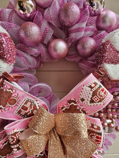 Go pink this Christmas. Full pink and white mesh based wreath with pink and white lollipops, baubles and a large pink gingerbread bow ! Be different this Christmas DM for details £50 www.steveswreathdecs.co.uk Pink Christmas Wreath Ideas, Pink Christmas Tree Decorations, Christmas Reef, Pink Christmas Wreath, Pink Gingerbread, Pink Ornament, Go Pink, Pink Christmas Tree, Christmas Wreaths Diy