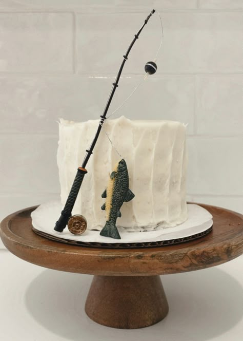 The theme of Charlie's birthday was fish since he is o-FISH-ally one! We loved this cake from Susie's Cakes and just added the fish topper. | mom, birthday, cake, food, boy, fish, one, celebration Fishing Party Food, Fish Cake Birthday, Fishing Themed Birthday Party, Susie Cakes, Fishing Cake, Baby Shower Fishing, Fishing Birthday Party, Fishing Party, Buy Cookies