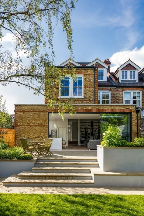 Dunmore Road House / Granit Architects 1 House Terrace Ideas, Victorian Semi Detached House, Hardscape Patio, Sloping Roof, House Extension Plans, Patio Plans, Raised Patio, Patio Steps, British Architecture