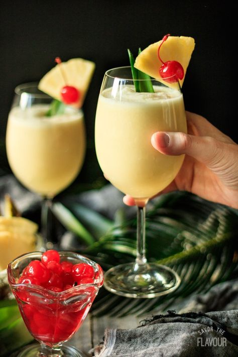 Non Alcoholic Piña Colada: whip up this easy tropical drink for kids of all ages to enjoy at your next party. Cream of coconut, crushed pineapple, and pineapple juice mixed with ice is so refreshing on a hot day. Whether you are sitting on the beach or just wishing for a vacay to the tropics, one sip of this classic drink will transport you to the islands. Enjoy this simple recipe today! | www.savortheflavour.com #pinacolada #nonalcoholic #mocktail #tropical #recipe Pina Colada Recipe Non Alcoholic, Cream Of Coconut, Pina Colada Recipe, Drink Recipes Nonalcoholic, Non Alcoholic Cocktails, Alcoholic Cocktails, Tropical Drink, Mocktail Recipe, Punch Recipes