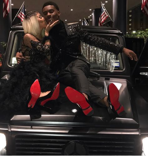 Red And Black Homecoming Couple, Black Prom Ideas Couples, Prom Cars Black People, Black Couple Prom Outfits, Black Prom Outfits For Couples, Prom Pictures Black People, Black And Red Prom Couple, Black Prom Couples, Red And Black Prom Couples