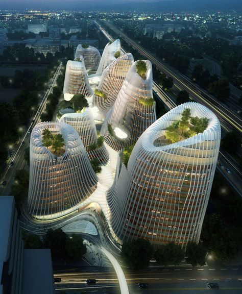 After sweeping architectural contests in Rome and Paris, Ma was invited to outline a master plan for a 200,000-square-meter commercial and retail project in Amsterdam's Zuidas business district. He unveiled architectural drawings for structures that resemble a cluster of crater-tipped mountains. Echoing Taoist paintings of peaks and pagodas, its volcano-shaped towers will be linked with a meandering series of courtyards, waterways, and pavilions that organically unite the complex. (Caption... Architecture Cool, Mad Architects, Architecture Unique, Guiyang, Futuristic Building, Tall Buildings, Interesting Buildings, Green Architecture, Amazing Buildings