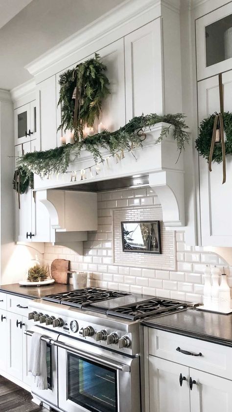 tuxedofarmhouse on Instagram: Who loves a kitchen with a little holiday jewelry? So many of you have asked how I tied my bells and bows to my large hood wreath, so… Wreath In Kitchen, Sw Anew Gray, Wreaths On Kitchen Cabinets, Sw Alabaster, Breakfast Bakes, Wreath Kitchen, Anew Gray, Cedar Wreath, Kitchen Wreath