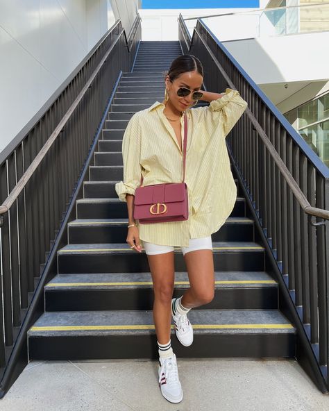 Sincerely Jules wearing pinstripe yellow oversized shirt with biker shorts Zara Street Style, Outfits With Striped Shirts, Oversized Shirt Outfit, California Outfits, Mum Fashion, Striped Shirt Dress, Cooler Look, Outfit Trends, Summer Outfit Inspiration