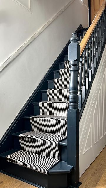 Painted Stripes On Stairs, Stripy Stair Carpet And Landing, End Of Stairs Ideas, Dark Stairs Carpet, Victorian Bannister Ideas, Farrow And Ball Railings Stair Bannister, Grey Stairs With Runner, Painted Stairs And Runner, Dark Grey Stairs