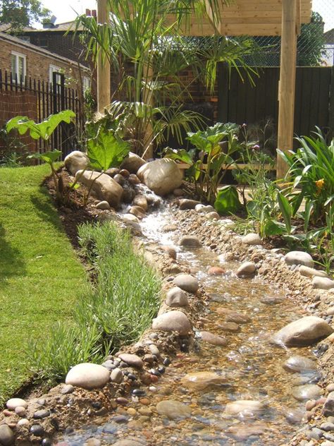 water feature Farmhouse Water Feature, Garden River Water Feature, Backyard Creek, Diy River Rock, Backyard Stream, Landscaping Water Feature, Backyard Waterfall, Wildlife Pond, Big Boots