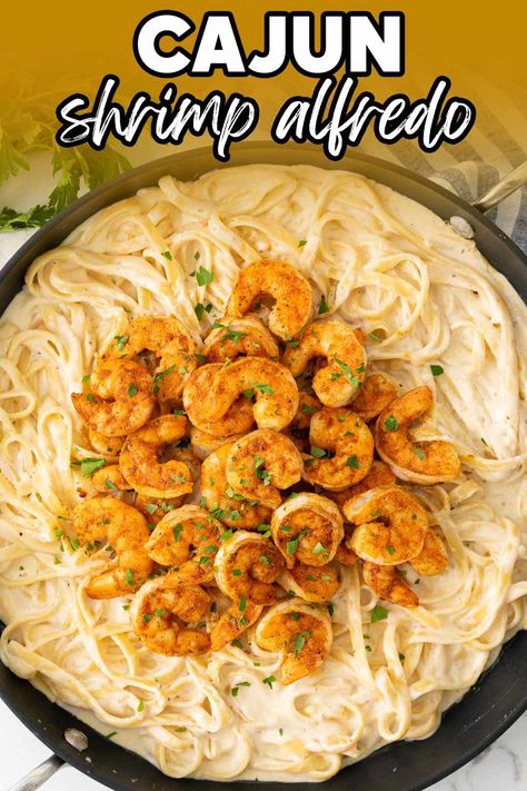 This easy Cajun Shrimp Alfredo is a spicy twist on classic Alfredo pasta.  Cajun seasoned shrimp, al dente fettuccine, and a creamy Alfredo sauce come together in less than 30 minutes for a mouthwatering meal that's sure to impress. Perfect for busy weeknights or special occasions, this easy recipe will become a new family favorite! Easy Cajun Alfredo Pasta, Shrimp Alfredo Pasta With Jar Sauce Easy, One Pot Cajun Alfredo, Cajun Shrimp Alfredo Recipe, Easy Shrimp Alfredo With Jar Sauce, Spicy Shrimp Alfredo, Cajun Shrimp Alfredo Pasta, Cajun Salmon And Shrimp Alfredo, Cajun Shrimp Alfredo