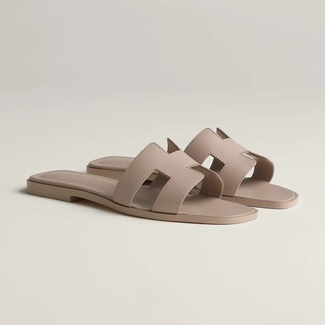 Shop the Best Luxury Fashion Items at Every Price Point | Who What Wear Hermes Oran Sandals, Hermes Style, Beige Sandals, Hermes Shoes, Hermes Oran, Elegant Shoes, Designer Sandals, Sandal Fashion, Green Leather