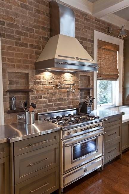 Love this brown brick backsplash get the same look DIY with our faux brick panels easy to install kitchen remodel Modern Lofts, Brick Wall Kitchen, Creative Backsplash, Backsplash Design, Brick Kitchen, Brick Backsplash, Kitchen Walls, Stainless Steel Countertops, Brick Veneer