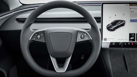 It's no yoke, the new Tesla Model 3's steering wheel and stalkless steering column add key functionality yet appear even more streamlined than before. New Tesla, Steering Column, Automotive News, Tesla Model, Tesla, Steering Wheel