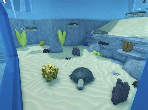 Aquarium Bloxburg, Bloxburg Fish Tank, Bloxburg Aquarium Decals, Bloxburg Animals, Adopt Me Small House Ideas, Mermaid Castle, Japanese Dining Table, Bloxburg City, Bloxburg Beach House