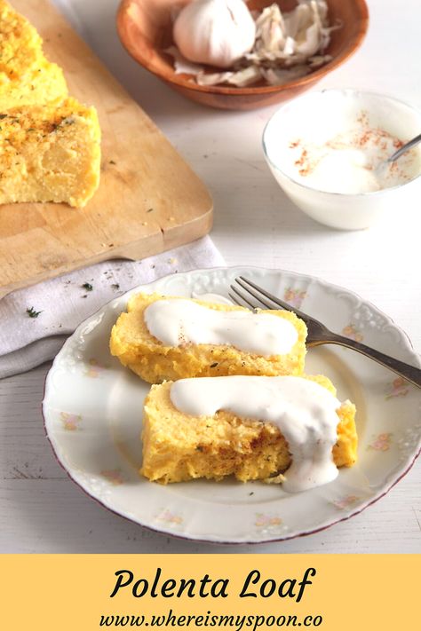 Polenta loaf – a fluffy polenta souffle served with a delicious garlic yogurt sauce. #whereismyspoon #polentaloaf #bakedpolenta #polentasouffle #polentarecipes #howtomakepolenta #cornmealloaf #cornmealrecipes Polenta Souffle, Romanian Polenta, Polenta Recipes Vegan, Garlic Yogurt Sauce, Malai Recipe, Cornmeal Recipes, Garlic Yogurt, Baked Polenta, Eastern European Recipes