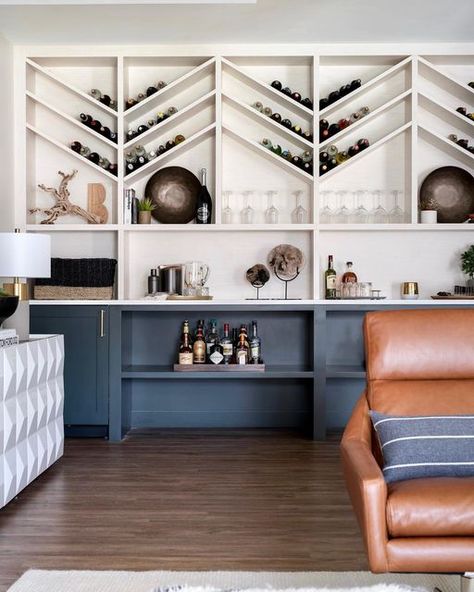 Kristen Apicerno Interiors on Instagram: "Swipe for before video! 🫣 A chic couple built a forever family home in Wrentham, MA. Their happily ever after included an unexpected lower level oozing edgy, sexy, mid-century modern glam. With 2,500 SF of unfinished space, our clients’ desires for impressive wine storage and a space prime for entertaining, we got right to work. We carved the lower level into seven zones that align with their lifestyle including this epic lounge area. The grand cente Mid Century Modern Glam, Basement Bar Design, Glass House Design, Basement Family Room, Chevron Wall, Design A Space, Leather Lounge, Lounge Seating, Beautiful Living Rooms