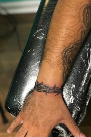 Tattoo uploaded by Roger Picasso Hora • Thorns on wrist tattoo! • Tattoodo Wrist Thorn Tattoo, Crown Of Thorns Tattoo Around Wrist, Thorn Ring Tattoo, Thorn Wrist Tattoo Men, Thorns Wrist Tattoo, Thorns Around Wrist Tattoo, Best Looking Tattoos For Men, Thorns Crown Tattoo, Christian Spine Tattoo Men