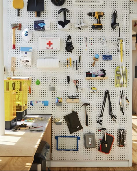 Pegboard Workshop, Peg Board Garage, Creative Workspace Inspiration, Track Shelving, Workspace Studio, Pulley System, Brooklyn Apartment, Basement Makeover, Uniqlo Bags