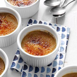 Rum Raisin Creme Brulee Recipe: How to Make It | Taste of Home Turkey Roasting Pan, Creme Brulee Recipe, Brulee Recipe, Caramelized Sugar, Roasting Pan, Vanilla Flavoring, Washington Post, Food Network, Flan