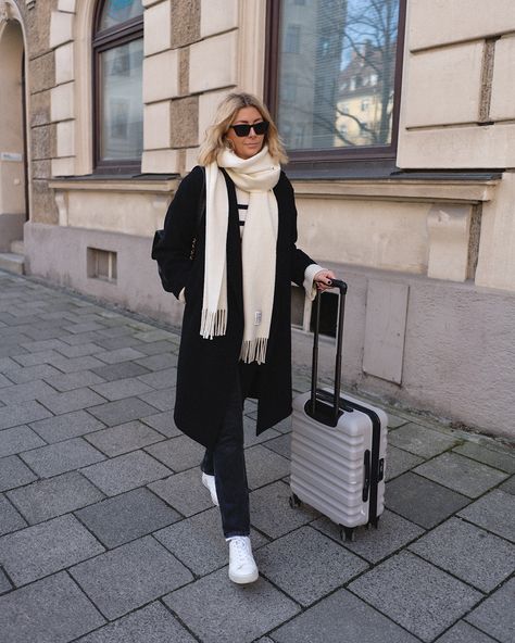 Cream scarf, black wool coat, black straight leg jeans, stripe jumper, Le Specs sunglasses, Veja Campo trainers, Chanel vintage backpack, weekend cabin suitcase Cream Scarf Outfit, Big Scarf Outfit, Brown Coat Outfit, Chanel Inspired Outfit, Emma Hill, Cream Scarf, Winter Weekend, Chic Outerwear, Jumper Outfit