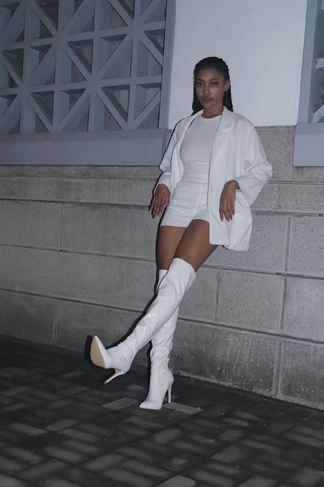 White High Heel Boots Outfit, White Shorts And Boots Outfits, White Boots Night Outfit, White Boots Party Outfit, White Dress White Boots, White Heeled Boots Outfit, White Dress With White Boots, White Heel Boots Outfit, White Boots With Jeans