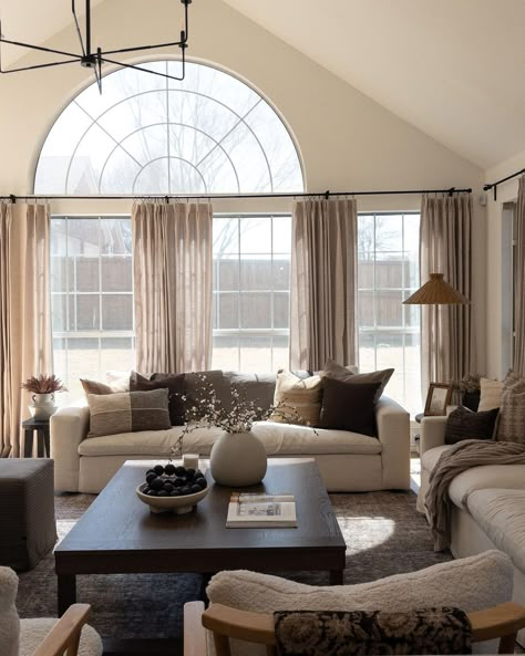 Beige Recliner Living Room, Living Room Decor Vaulted Ceiling, Minimalist Transitional Living Room, Cozy Modern Traditional Living Room, Beige Couch Curtain Ideas, White And Dark Brown Living Room, Cozy Formal Living Room Ideas, Rectangle Living Room Layout With Tv, Double Rug Living Room