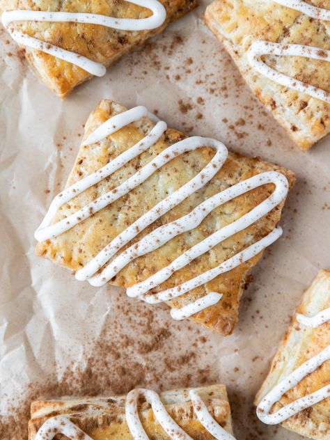 Looking down on a cinnamon roll pop-tart with vanilla icing and cinnamon sprinkled on top Brown Sugar Pie, Sugar Pie Crust, Homemade Cinnamon Roll, Cinnamon Sugar Recipes, Cream Cheese Puff Pastry, Poptart Recipe, Puff Pastry Filling, Sugar Recipes, Tart Filling