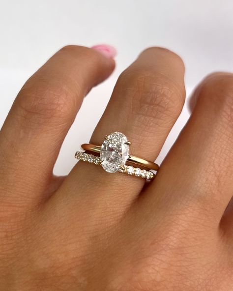 Nothing beats a classic stack! Our Aviva ring with an oval cut diamond paired with the Ellie band • #finejewelry #diamond #ovaldiamond #engagement #engagementring #weddingband #goldring #ringstack #ovalengagementring #classicengagementring #solitarering Oval Engagement Ring Stacked Bands, Wedding Band Stack Ideas Oval, Oval Ring Stack, Oval Engagement Ring Stack, Dimond Engagement Rings, Engagement Ring Stack, Stacked Engagement Ring, Oval Solitaire Engagement Ring, Stacked Wedding Bands