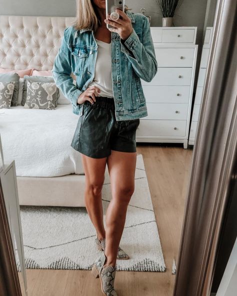 Faux leather shorts, Denim jacket and ankle booties Shorts For Fall Outfit, Black Leather Shorts Outfit Fall, Fall Outfit With Shorts, Leather Shorts Fall Outfit, Leather Shorts Outfit Winter, Faux Leather Shirt Outfit, Faux Leather Shorts Outfit, Black Leather Shorts Outfit, Fall Shorts Outfit