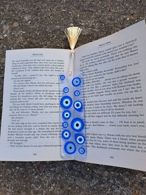 Evil Eye Bookmark, Evil Eye Bookmark Painting, Spiritual Bookmarks Diy, Bookmark Ideas Mandala, Galaxy Bookmark Resin, Blue Resin Bookmark, Star Bookmark, Vinyl Aesthetic, Personalised Gifts Handmade