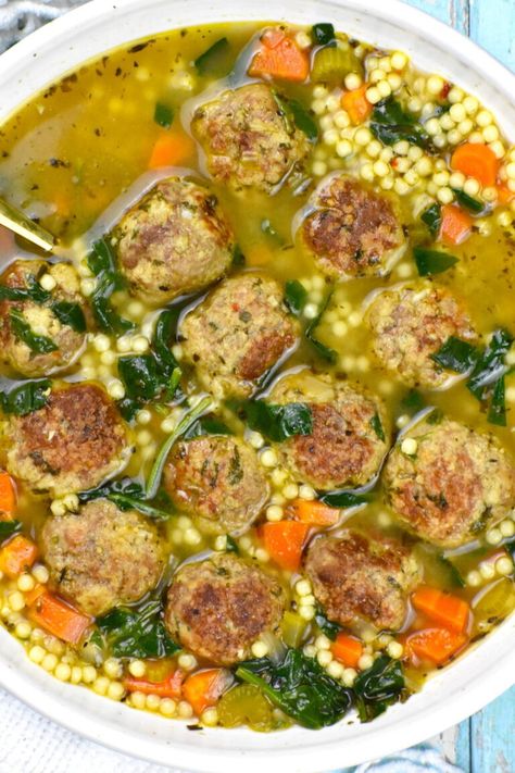 Italian Wedding Soup is a restaurant classic featuring hearty meatballs and pasta in a light and flavorful broth. Wedding Soup Meatball Recipe, Meatballs And Pasta, Best Italian Meatball Recipe, Pit Beef, Restaurant Classic, Italian Meatball Soup, Italian Wedding Soup Recipe, Pasta Restaurants, Italian Meatballs Recipe