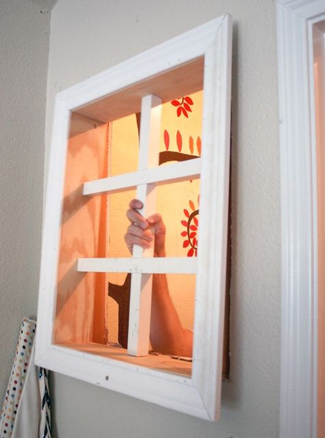 Indoor Playhouse Window & Mural – Remodelaholic Diy Playhouse Windows, Playhouse Windows Diy, Fort Playhouse, Playhouse Windows, Under Stairs Playhouse, Diy Kids Playhouse, Toy Makeover, Window Mural, Indoor Playhouse