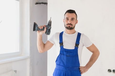 A repairman holds a drill in his hand an... | Premium Photo #Freepik #photo #house #man #home #worker Home Worker, Happy Husband, European Men, Smiling Man, Man Sitting, Car Illustration, Couple Dancing, Attractive People, Look In The Mirror