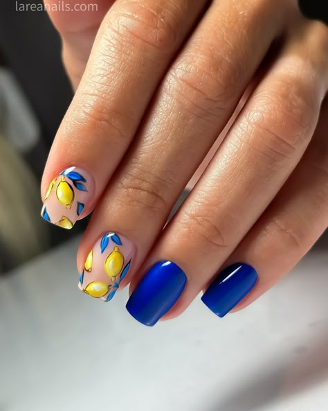 Brighten up your summer look with a blue manicure 💙 inspired by the iconic Dolce & Gabbana lemon print. 🍋🍋🍋 This vibrant nail art combines the refreshing hues of Royal blues with the zesty yellow of lemons, capturing the essence of sunny days and citrus groves. @lareanetwork #dolcegabbana #larea #njnails #russianmanicurenj #lareanails #lareanailsnj #lemonprint #lemonnails Amalfi Coast Nails Ideas, Blue And Yellow Lemon Nails, Blue And Yellow Nail Art Designs, Summer Lemon Nails, Almafi Coast Nails, Lemon Inspired Nails, Summer Italy Nails, Italy Nail Art, Lemon And Blue Nails