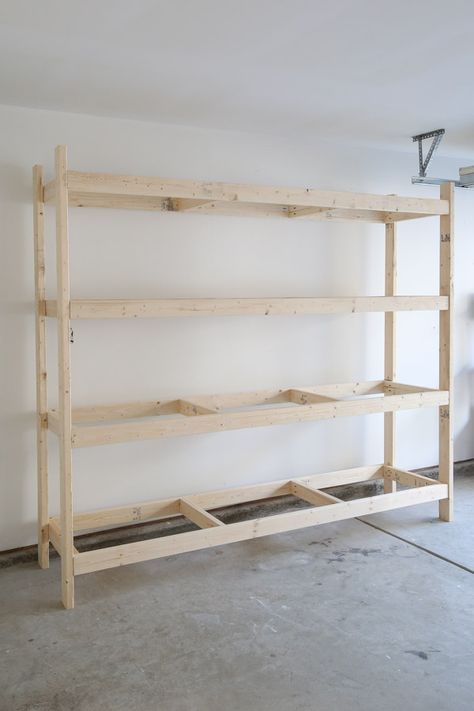 Learn how to easily build DIY wood garage shelves to add organization and storage to your garage! These DIY garage shelves can be customized to the size shelves you need. You can also build these DIY garage storage shelves in less than a weekend! Building Garage, Basement Shelving, Wooden Storage Shelves, Garage Storage Inspiration, Diy Storage Shelves, Garage Shelves, Garage Storage Shelves, Utility Shelves, Diy Garage Door