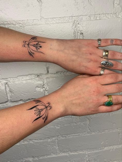 Hand To Forearm Tattoos For Women, Symmetrical Forearm Tattoo, Wrapping Tattoo Arm, Wrap Around Wrist Tattoos Non Floral, Double Arm Tattoo, Inverse Tattoo Negative Space, Tattoo Top Of Wrist, Long Tattoo Placement, Fka Twigs Tattoo