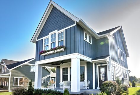 James_Hardie: This home is a great example of creating detail and texture with a variety of siding styles. Featured are HardiePlank lap siding HardiePanel vertical siding and straight-edge HardieShingle siding. If you like this color wed suggest expl https://t.co/Q8Ox9ODJ1g Coastal Exterior House Colors, Vertical Siding Exterior, Blue Vinyl Siding, Vertical Vinyl Siding, Siding Styles, Coastal Exterior, Exterior House Paint, Outside Paint, House Makeovers