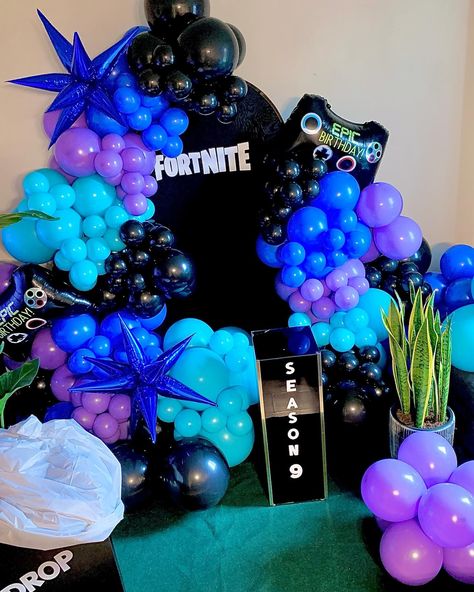 ⚔️Ethan’s Fortnite Season ‘9’ Theme⚔️ The best part of this setup was it was a complete surprise. He had no idea this was being done !!! Hope you all love this setup as much as we do💋 Please Like, Share, Comment! 🖤💙💜🩵 . . . . Full Setup + Concept & Styling: @feteicons Balloon Decor: @feteicons Backdrop: @feteicons Fortnite Props: @feteicons . . . . #feteicons #fortniteballoons #fortniteparty #fortnitetheme #battleroyale #battleroyaleparty #lootllama #haltonhillsballoons #oakvillemoms #geo... Fornite Theme Birthday Party, Fortnite Birthday Party Decor, Fornite Birthday Theme, Fortnite Balloons, Fortnite Birthday Decorations, Fortnite Birthday Party Decorations, Fortnite Decorations, Fortnite Party Decorations, Fortnite Backdrop