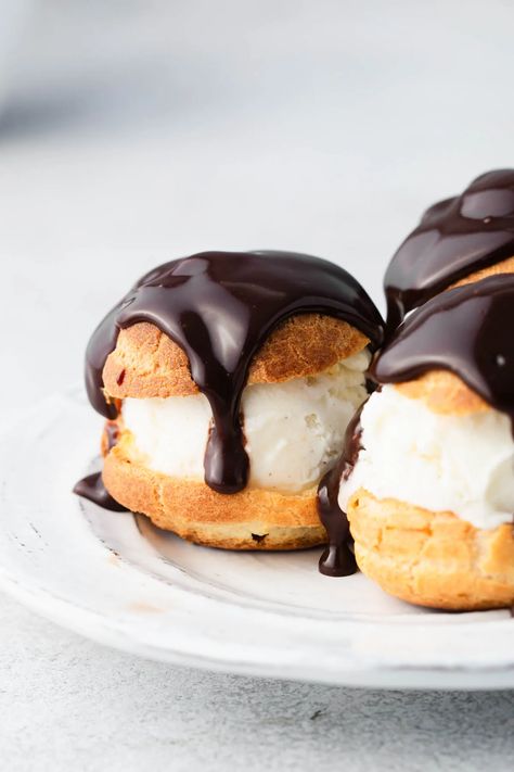 Profiteroles Recipe (Profiteroles au Chocolat) | Baker Street Society Profiterole Recipe, Mini Profiteroles, Chocolate Profiteroles, White Chocolate Profiteroles, Profiteroles Recipe Choux Pastry, Choux Cream Puff, Ice Cream Puffs, Profiteroles Recipe, Profiterole