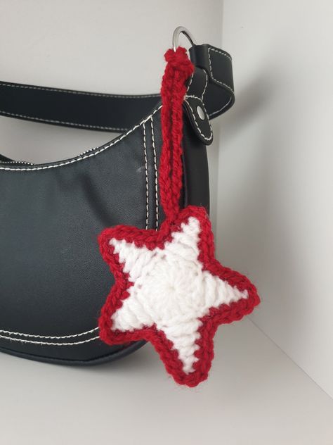 Handmade crochet star charm gift and to to accessorise a bag strap or keychain to add a pop of colour. I will have more colours up soon but please message me/leave a note if there is a specific colour option you would like and I can try to make that for you :) I have attached a video of me demonstrating how to attach the charm, which is easily removable but also secure. (delivery is included in the price) Crochet Keychain Pattern, Crochet Business, Crochet Clothing And Accessories, Kawaii Crochet, Crochet Stars, Crochet Table Runner, Fun Crochet Projects, Crochet Keychain, Diy Crochet Projects