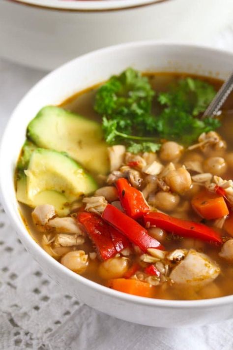 A spicy Mexican chicken soup with avocado and chickpeas, easy to make and so flavorful. #whereismyspoon #mexicanrecipes #mexicansoup #chickensoup #mexicanchickensoup Caldo Tlalpeno, Spicy Mexican Chicken, Mexican Chicken Soup, Chicken And Avocado, Soup With Chicken, Mexican Soup Chicken, Chicken Chickpea, Chicken Soup Recipe, Chickpea Soup