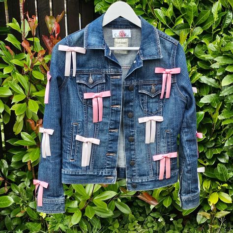 🎀Bow denim jacket available Friday 16th August🎀 . . . . #handmadeuk #handmadeclothingbrand #handmadewithlove #handmadeaccessories #upcycledclothing #upcycledfabric #upcycledfashion #cottagecore #coquetteaesthetic #etsyhandmade #etsyuk #etsyselleruk #etsysellerofinstagram #upcycledclothing #upcycledfashion #upcycleddenim #denimjacket #bowsbowsbows #ribbonbows #oneofakindgifts #oneofakindfashion #ribbon #pinkaesthetic #pinkpinkpink #summervibes #girlyaesthetic #sailormoonfans Diy Denim Jacket, Diy Denim, Denim Diy, Sewing Ribbon, Upcycled Fashion, Upcycled Denim, August 15, Handmade Clothes, Upcycle Clothes