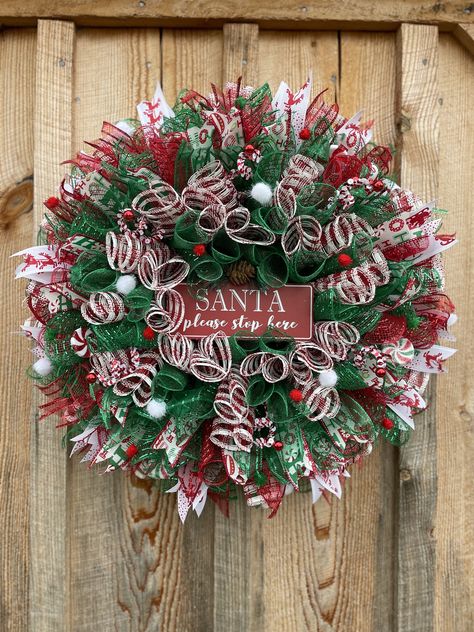 Celebrate Santa with this adorable mesh wreath, asking Santa to please stop at your house!!  Accented with ribbons, mint candies and decorative balls.  Made with luxurious poly mesh.  Measures 22" across Christmas Wreaths Mesh, Decor Mesh Wreath, Santa Wreaths Diy, Christmas Crafts Wreaths & Garlands, Mesh Wreaths Christmas, Christmas Deco Mesh Wreaths, Christmas Wreaths Santa, Winter Deco Mesh Wreath, Deco Mesh Christmas Wreaths Diy