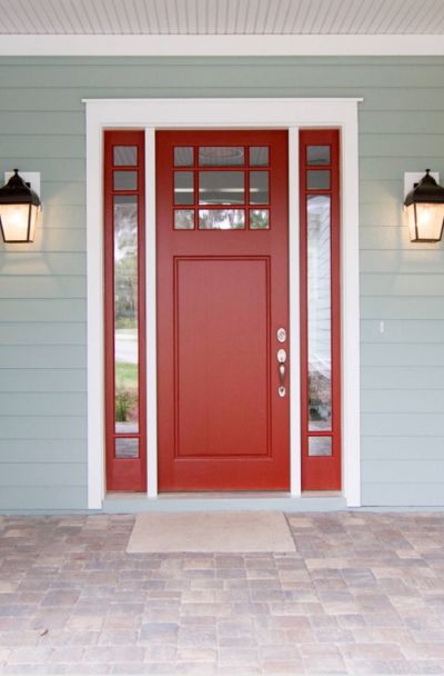 31 Houses with Red Front Entry Door Ideas | Sebring Design Build Red Front Doors With Glass Panels, Burnt Red Front Door, Houses With Red Front Doors, Red Front Door Paint Color, Red Front Door Decor, Red Front Door Ideas, Red Door Yellow Door, Red Front Doors, Entry Door Ideas