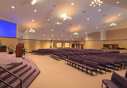 Midwest Church Sanctuary Church Sanctuary Design, Church Design Sanctuary, Purple Chairs, Sanctuary Design, Church Building Plans, Colored Chairs, Sanctuary Decor, Church Sanctuary, Church Lobby