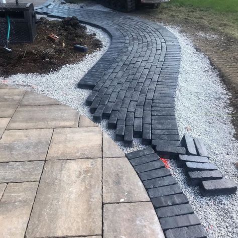 Elemental Landscapes Ltd.’s Instagram post: “Progress on the @unilock #bristol valley patio renovation in #Frankfort. The #black #copthorn is perfect #contrast for the #earthy…” Patio Renovation, Brick Sidewalk, Driveway Paving, Black Brick, Brick Pavers, Brick Road, Walkway, Yard Ideas, Driveway