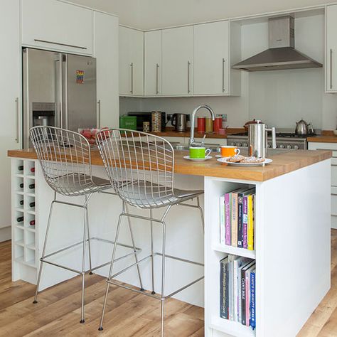 White kitchen with breakfast bar | Kitchen decorating | Ideal Home | Housetohome.co.uk Breakfast Bar Small Kitchen, Kitchen Island With Columns, Breakfast Bar Kitchen Island, Kitchen Bookshelf, Kitchen Ideals, Breakfast Bar Kitchen, Kitchen Diner, Trendy Kitchen, Minimalist Kitchen