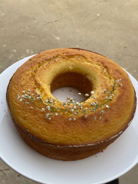 simple orange pound cake with aesthetic white flowers decoration Pound Cake Aesthetic, Orange Cake Aesthetic, White Flowers Decoration, Cottage Core Cake, Orange Pound Cake, Cake Aesthetic, Flowers Decoration, Aesthetic White, Orange Cake