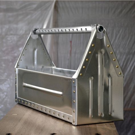 Aluminum sheet metal toolbox, aircraft rivets, cross-drilled handle, bead rolled panels. A fun, handmade project. Sheet Metal Crafts, Aluminum Sheet Metal, Sheet Metal Work, Sheet Metal Tools, Metal Tool Box, Wooden Tool Boxes, Metal Ideas, Sheet Metal Fabrication, Metal Workshop