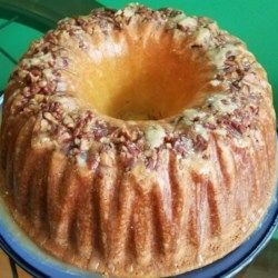 A rich and delicious sour cream pound cake is baked in a Bundt pan lined with chopped pecans. Pecan Sour Cream Pound Cake Recipe, Best Rum Cake Recipe, Cinnamon Breakfast, Sour Cream Pound Cake, Rum Cake, Bundt Cakes Recipes, Pound Cake Recipes, Breakfast Cake, Cake Flour